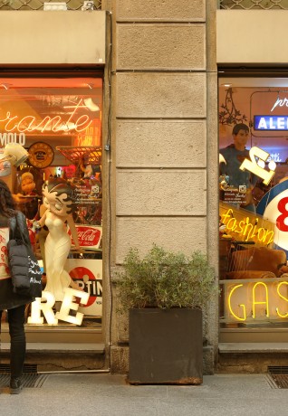a student reading Italian words in a vintage shop