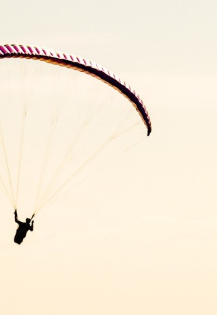 paragliding at sunset